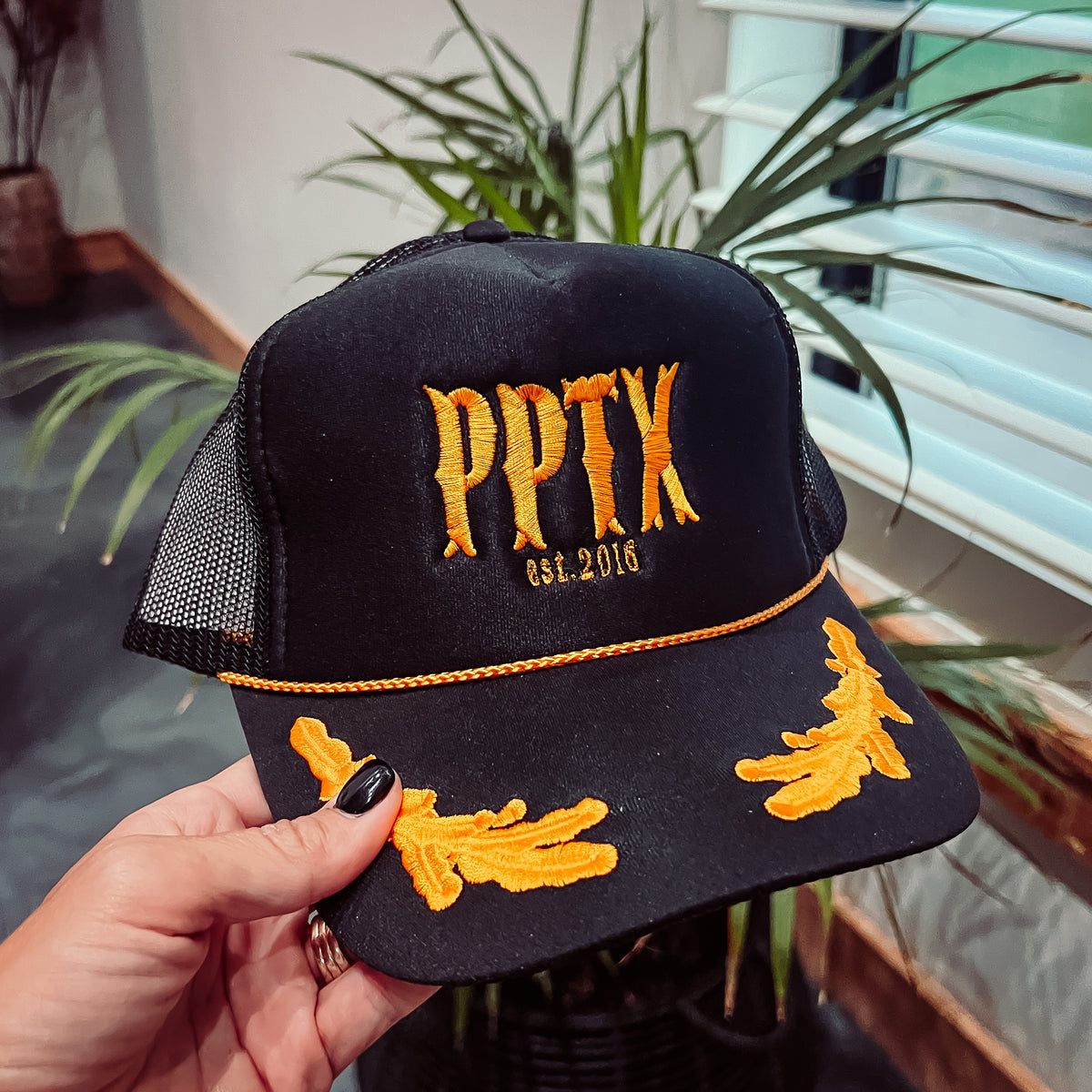 Black/Gold PPTX Trucker