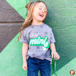 Kids Grey short sleeve tee with dark grey stars on it and says luckiest mini with a small shamrock on the front